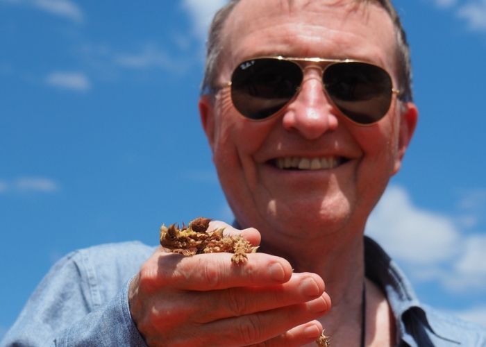 Professor Lovejoy (pictured here with a Thorny Devil) visited Newhaven Wildlife Sanctuary in Central Australia in 2016, prior to the launch of the major rewilding project there. 